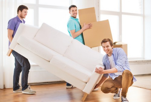 Moving a sofa from a flat with narrow access in Covent Garden