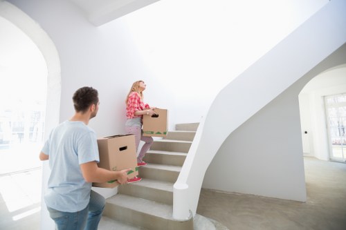 Removal team planning a move in Covent Garden with boxes and furniture